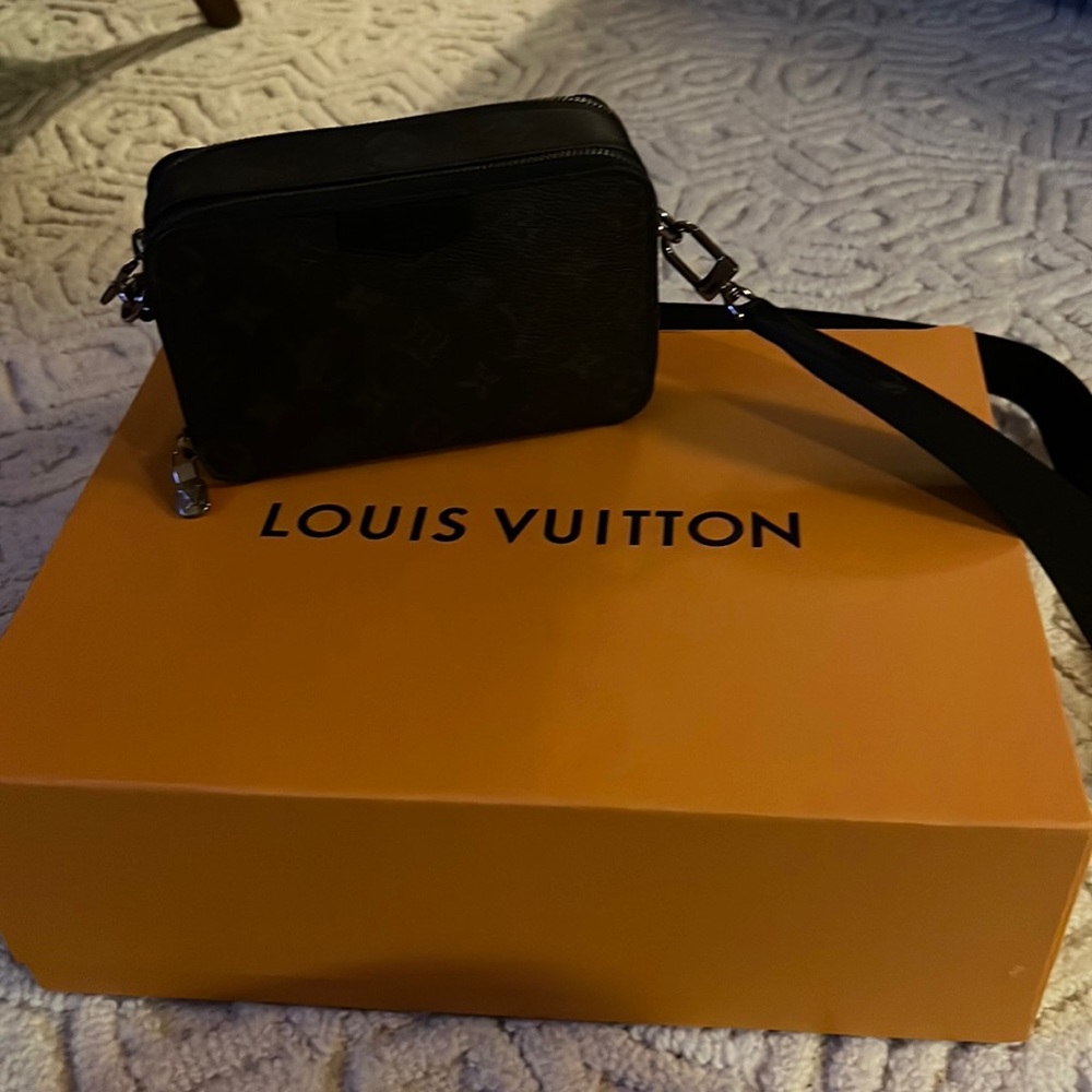 Louis Vuitton Men’s ‘wearable wallet’ with strap